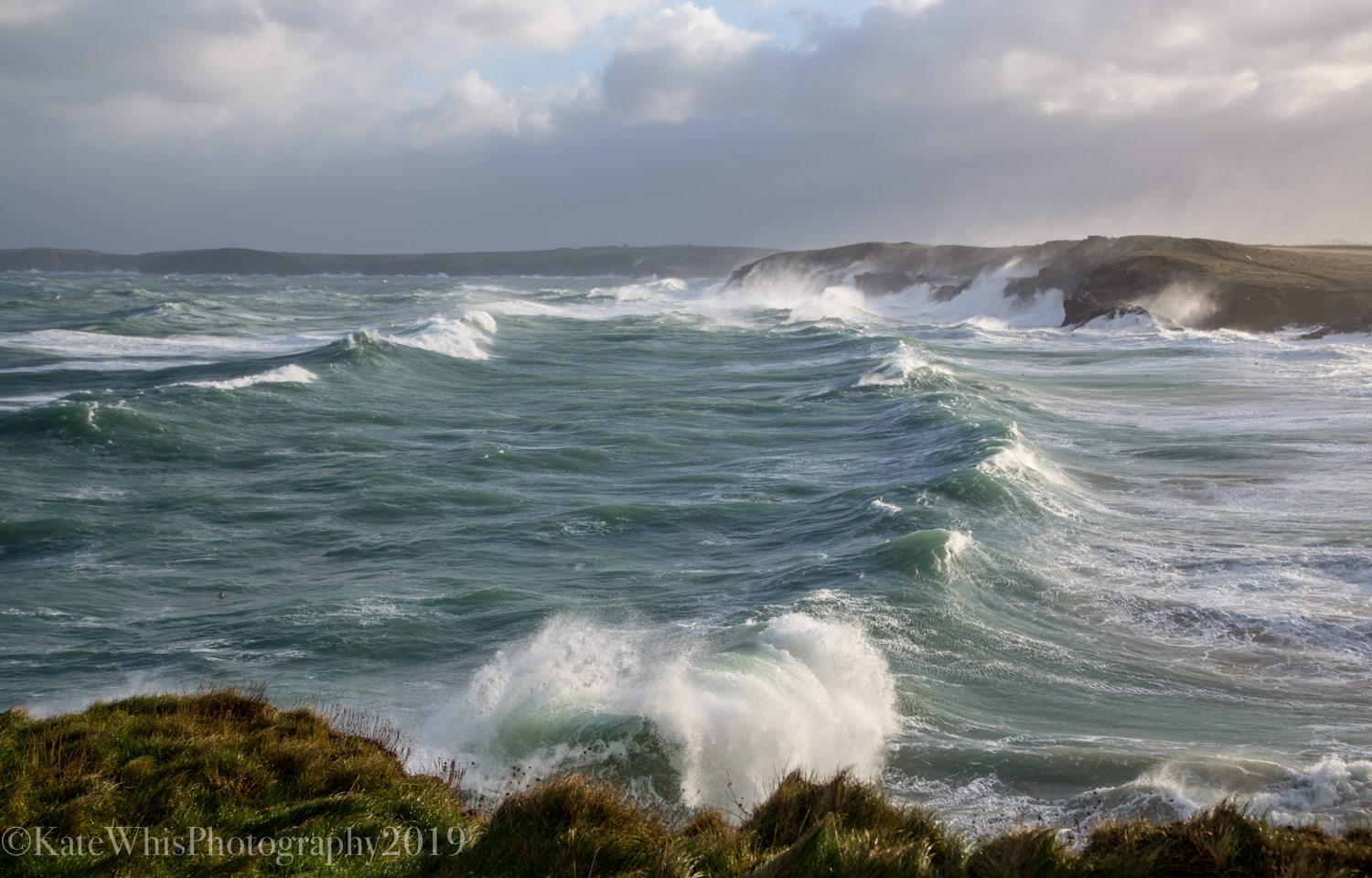 Big waves breaking into the bay at Mother Ivey's Bay