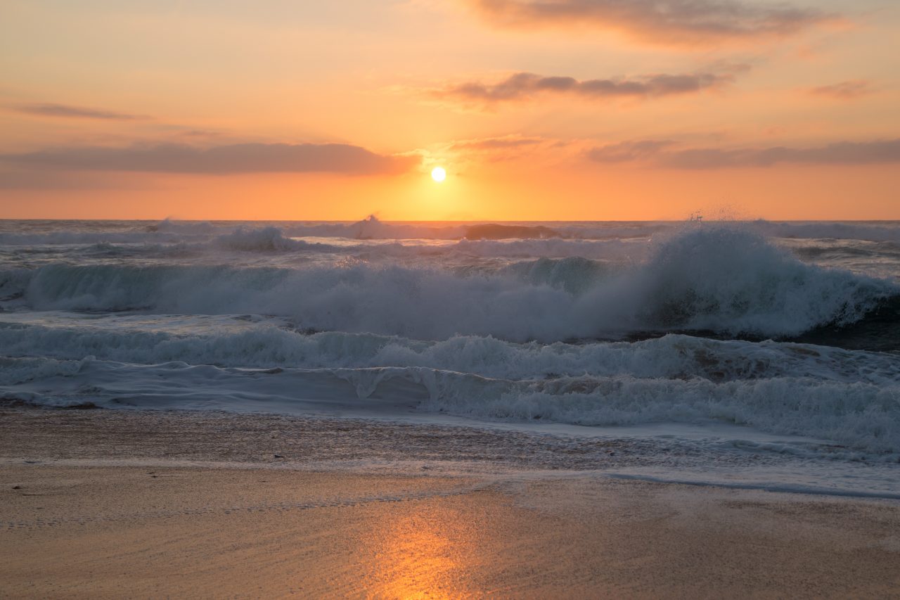 sunset and waves at Constantine Bay