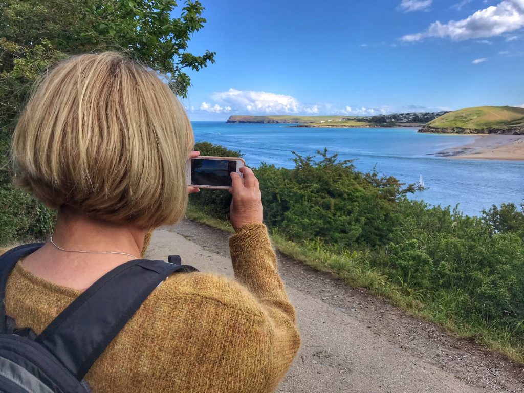 Client using her smart phone on my guided photography walk