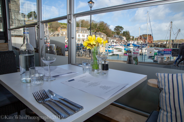 view of Padstow harbour from inside The Basement resturant